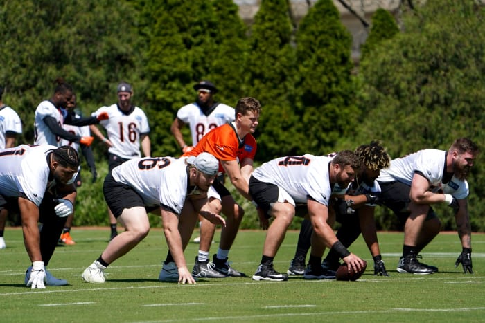 Cincinnati Bengals quarterback Joe Burrow (9) takes a snap during practice, Tuesday, May 17, 2022, at the Paul Brown Stadium practice fields in Cincinnati. Cincinnati Bengals Practice May 17 0106